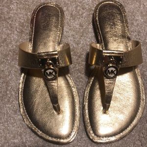 Michael Kors gold sandal. Brand new. Never worn
